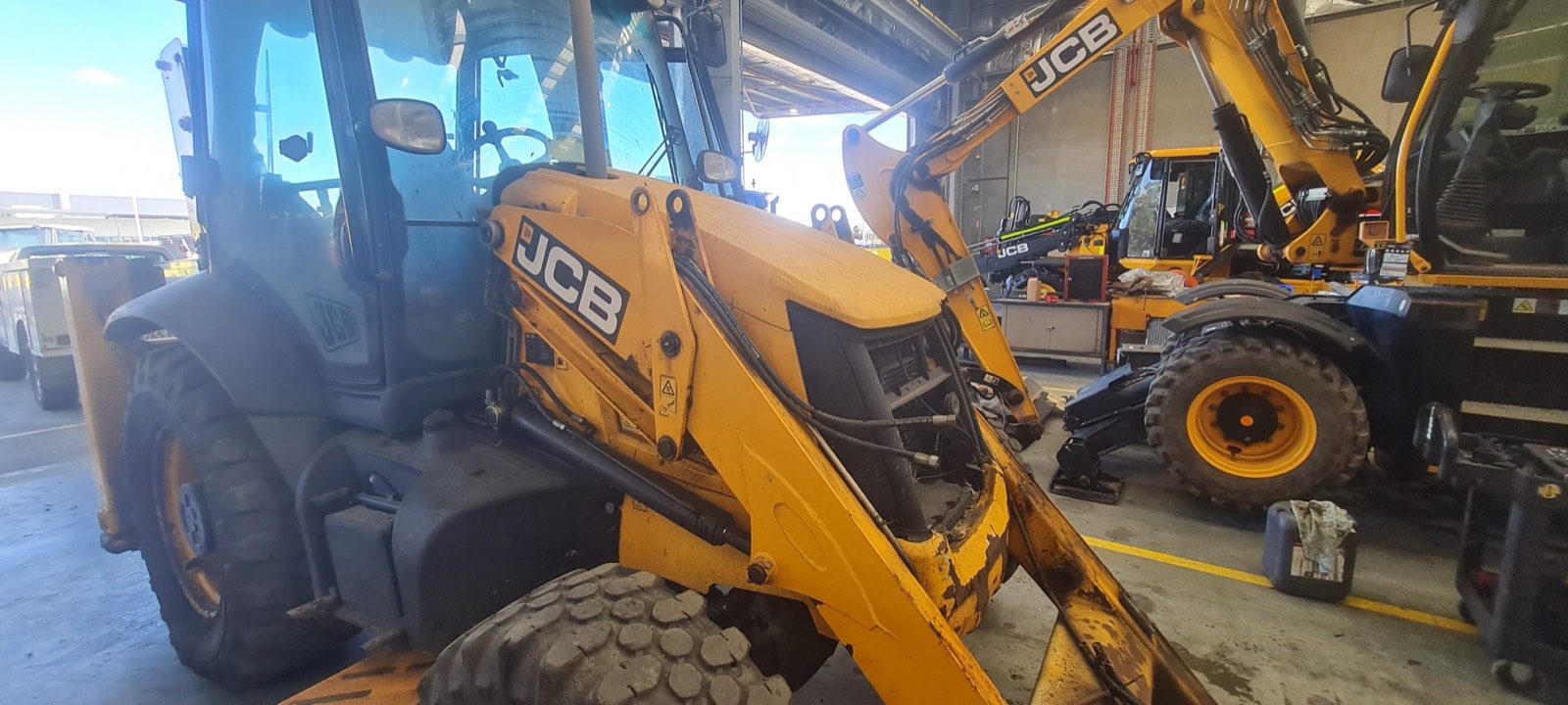 JCB loader linkage maintenance on the Sunshine Coast